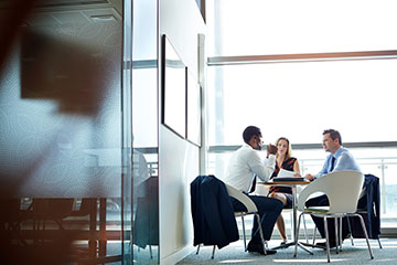 Group of Employees in Conference